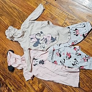 2 Minnie Mouse onsies and 1 Minnie Mouse pants.